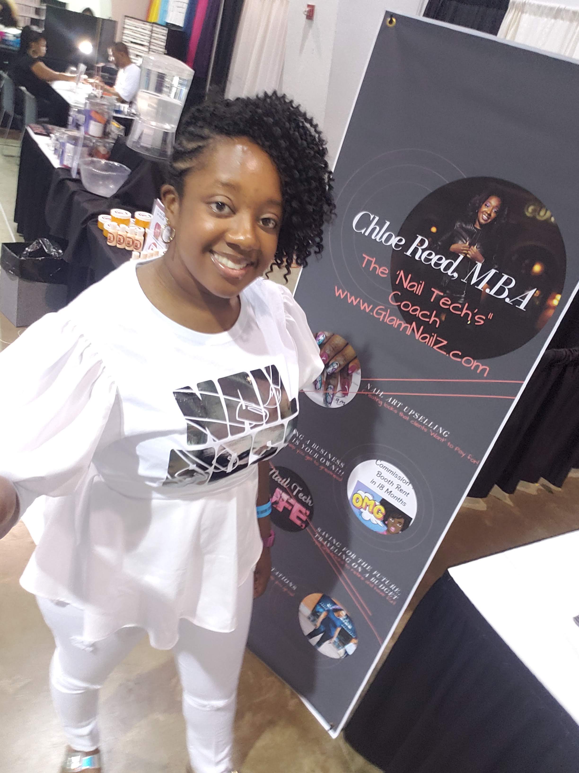 Chloe Elizabeth Reed speaking to nail technicians on business growth